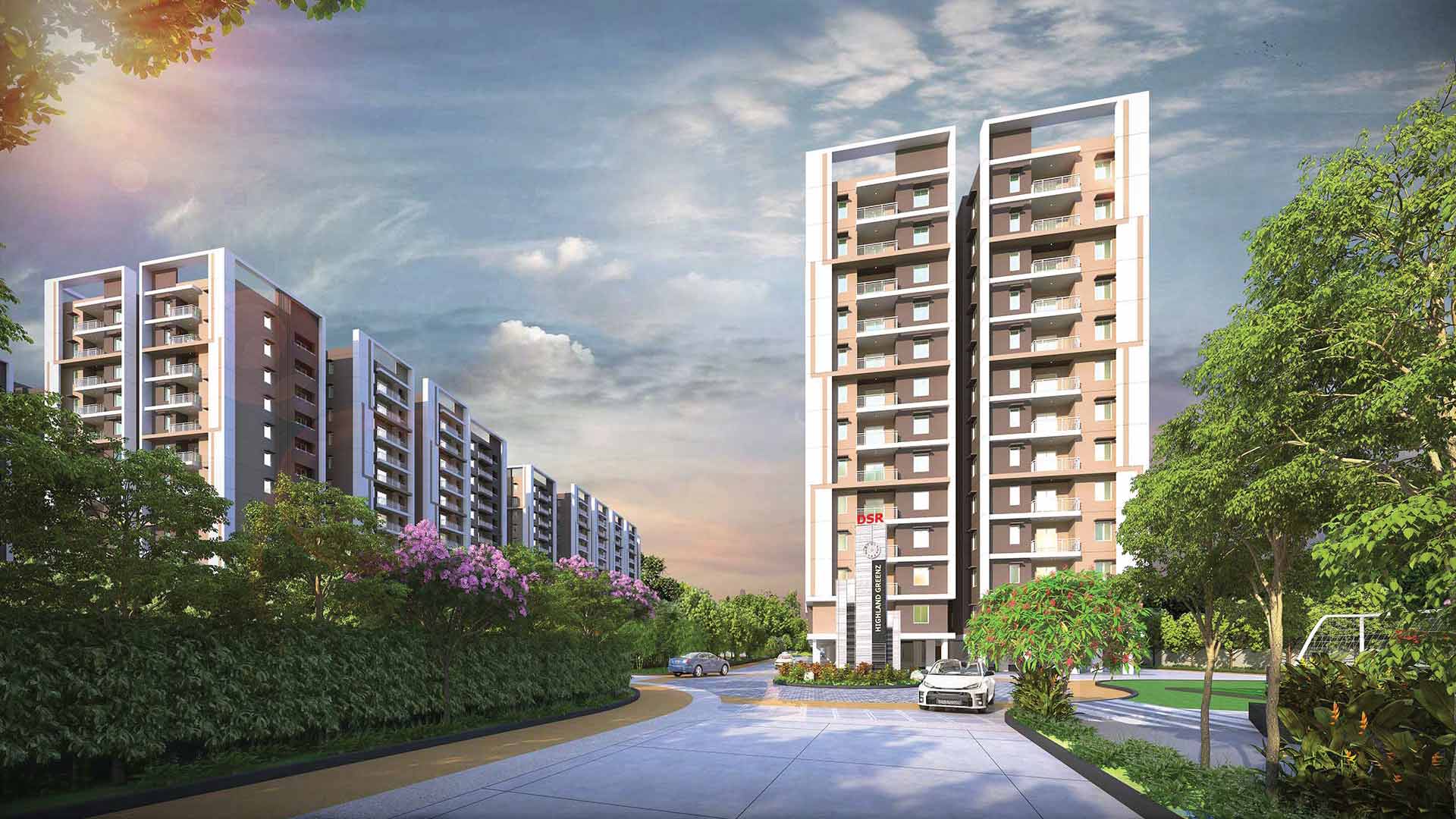 Landscaped apartment pathway with pedestrian walkway at dsr highland greenz in doddakannelli, bengaluru
