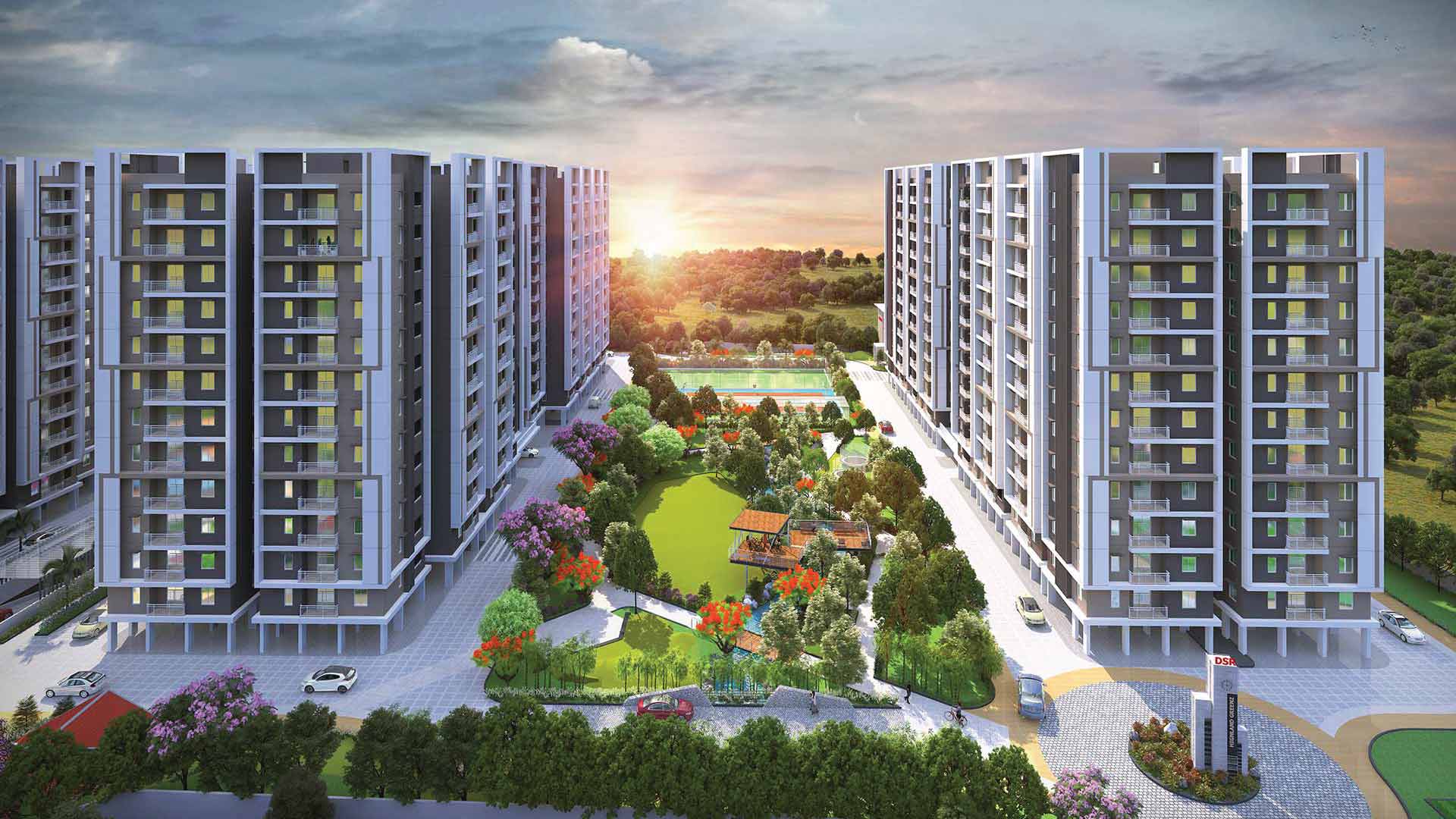 Elevation view between residential towers with children's play area at dsr highland greenz in doddakannelli, bengaluru